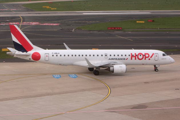 Embraer EMB 190 Regional jet of Air France KLM subsidiary HOP with registration F HBLH rolls to gate at Düsseldorf Airport, North Rhine-Westphalia, Germany