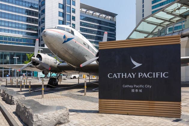 Cathay Pacific City headquarters Douglas DC 3 aircraft Hong Kong Hong Kong airport Hong Kong, China 20 September 2019 A Douglas DC 3 aircraft with registration VR HDA in front of the Cathay Pacific City at Hong Kong airport HKG in China