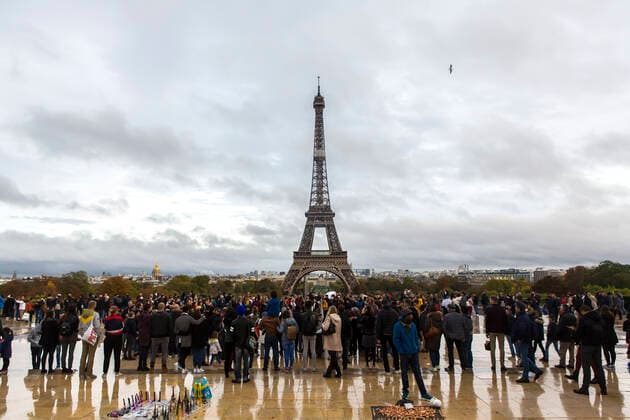 The Eiffel Tower La Tour Eiffel is a 324 meter high iron lattice tower in Paris It stands in the 7 Arrondissement at the northwestern end of the Champ de Mars Marsfeld, near the banks of the Seine Eiffel Tower.
