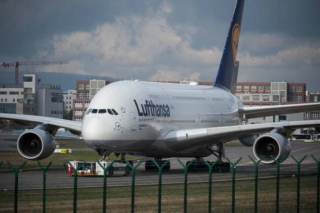 Frankfurt am Main Airport 19 11 2019 Frankfurt x1x Frankfurt Airport, view from the Zeppelinheim viewing platform In the picture an aircraft of the German Lufthansa Airbus A380 800, D AIMF is towed by a tug across the tarmac Frankfurt Frankfurt Hessen Germany
