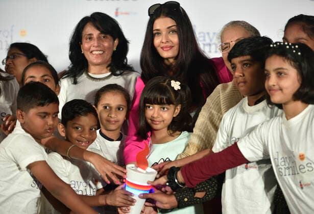 MUMBAI, INDIA - NOVEMBER 20: Aishwarya Rai Bachchan along with her mother Vrinda Rai and her daughter Aaradhya celebrates her father s birth anniversary with underprivileged children at an event organised by Smile Foundation NGO, on November 20, 2019 in Mumbai, India. (Photo by Satish Bate Hindustan Times) Actress Aishwarya Rai Bachchan Celebrates Father s Birth Anniversary