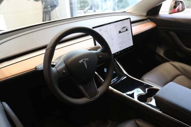 SHANGHAI, CHINA - NOVEMBER 22: The inner view of China-built Tesla Model 3 with its brand name in Chinese characters is seen at a Tesla store on November 22, 2019 in Shanghai, China. China s homegrown Tesla Model 3 will be sold at a starting price of 355,800 yuan (about 50,560 US dollars).  Copyright: xVCGx CFP111260252753