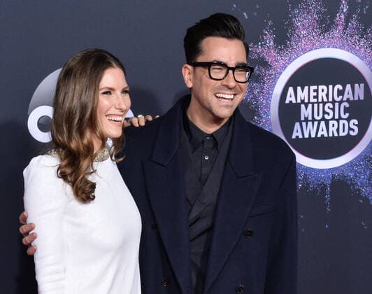 Actor Daniel Levy (R) and Sarah Levy arrives for the 47th annual American Music Awards at the Microsoft Theater in Los Angeles on Sunday, November 24, 2019.  LAP20191124248 JIMxRUYMEN
