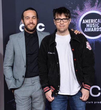 (L-R) Musicians Pete Wentz and Rivers Cuomo arrive for the 47th annual American Music Awards at the Microsoft Theater in Los Angeles on Sunday, November 24, 2019.  LAP20191124354 JIMxRUYMEN