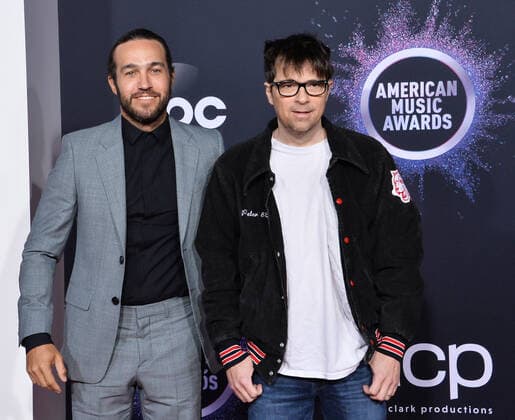 (L-R) Musicians Pete Wentz and Rivers Cuomo arrive for the 47th annual American Music Awards at the Microsoft Theater in Los Angeles on Sunday, November 24, 2019.  LAP20191124355 JIMxRUYMEN