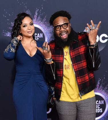 Singer Blanco Brown (R) and guest arrive for the 47th annual American Music Awards at the Microsoft Theater in Los Angeles on Sunday, November 24, 2019.  LAP20191124268 JIMxRUYMEN