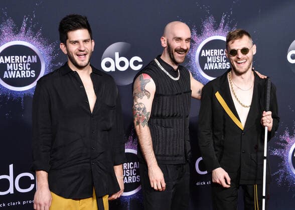 (L-R) Adam Levin, Sam Harris, and Casey Harris of X Ambassadors arrive for the 47th annual American Music Awards at the Microsoft Theater in Los Angeles on Sunday, November 24, 2019.  LAP20191124401 JIMxRUYMEN