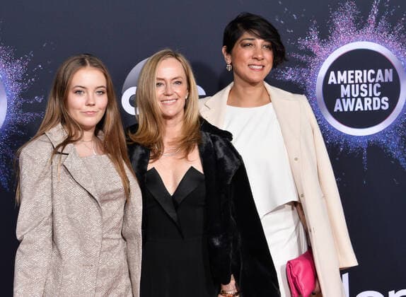 Karey Burke (C) arrives for the 47th annual American Music Awards at the Microsoft Theater in Los Angeles on Sunday, November 24, 2019.  LAP20191124427 JIMxRUYMEN