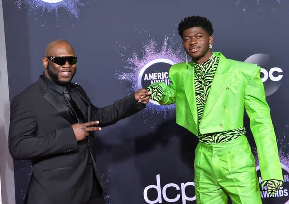 (L-R) Robert Stafford and rapper Lil Nas X arrive for the 47th annual American Music Awards at the Microsoft Theater in Los Angeles on Sunday, November 24, 2019.  LAP20191124431 JIMxRUYMEN