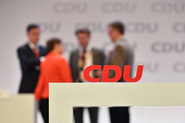 Feature, border motive CDU logo in the background stand Annegret KRAMP KARRENBAUER CDU chairman with left David McAllister, Daniel Caspary, Michael Grosse Broemer 32 party congress of the CDU Germany on 23 11 2019, Congress Centrum Leipzig,