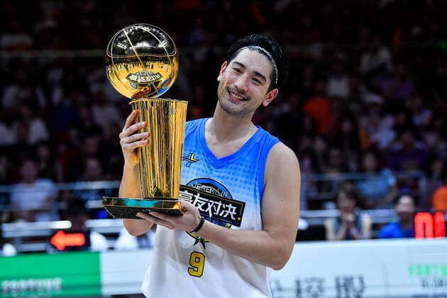 --File--Godfrey Gao holds a cup after the Jeremy Lin Star Show basketball match in Guangzou city, south China s Guangdong province, 10 August 2019. Godfrey Gao, Taiwanese-Canadian model and actor, and first Asian model to be signed on by luxury brand Louis Vuitton, had heart attack while filming for Chase Me , a Chinese city-and-sport-themed reality show broadcast by Zhejiang Television. Godfrey Gao passed away after hours of rescue in Ningbo city, east China s Zhejiang province, 27 November 2019. Godfrey Gao passed away while filming for Chase Me reality show in east China  729154686677812444