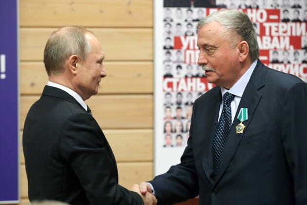 ST PETERSBURG, RUSSIA - NOVEMBER 27, 2019: Russia s President Vladimir Putin (L) and Nikolai Kononov, a member of the Veterans Council of the Turbostroitel judo club, awarded the Order of Friendship, during a ceremony to present state awards at the Turbostroitel judo club. Mikhail Tereshchenko TASS  TS0C5041