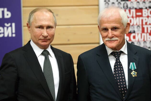ST PETERSBURG, RUSSIA - NOVEMBER 27, 2019: Russia s President Vladimir Putin (L) and Valentin Stepanov, a member of the Veterans Council of the Turbostroitel judo club, awarded the Order of Friendship, during a ceremony to present state awards at the Turbostroitel judo club. Mikhail Tereshchenko TASS  TS0C504C