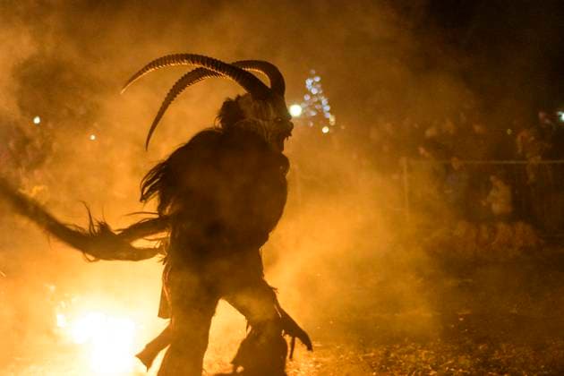 Perchtenlauf (Krampus run, mask procession) with Krampus, fire Vösendorf Niederösterreich, Lower Austria Austria Wienerwald, Vienna Woods