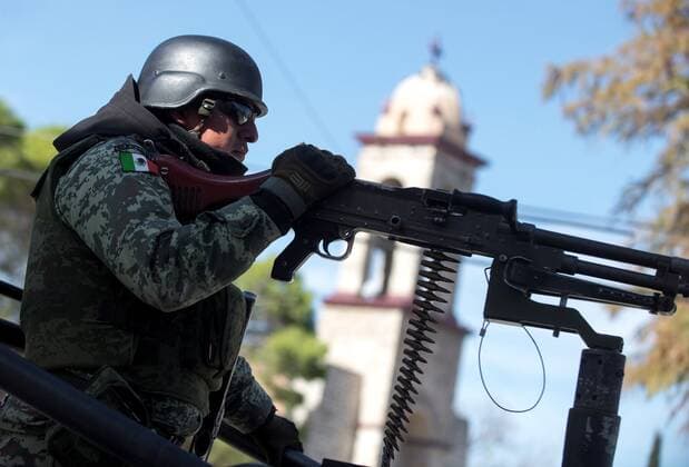 Agents of the National Guard watch over the town of Villa Union, in the state of Coahuila, Mexico, 2 December 2019, after an armed attack last Saturday. The strong clashes between assassins and security forces in the northern Mexican state of Coahuila left 22 people dead and the detention of at least two alleged perpetrators, official sources said Monday. 22 dead by shooting of hitmen and police in northern Mexico !ACHTUNG: NUR REDAKTIONELLE NUTZUNG!  Copyright: xMiguelxSierrax MEX549 20191202-637109202189968536