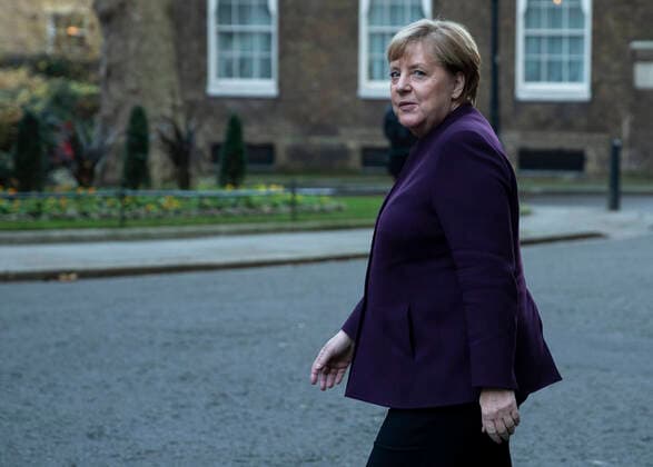 (191203) -- LONDON, Dec. 3, 2019 -- German Chancellor Angela Merkel arrives at 10 Downing Street to meet with British Prime Minister Boris Johnson, French President Emmanuel Macron and Turkish President Recep Tayyip Erdogan in London, Britain, on Dec. 3, 2019. ) BRITAIN-LONDON-MEETING-FRANCE-GERMANY-TURKEY HanxYan 