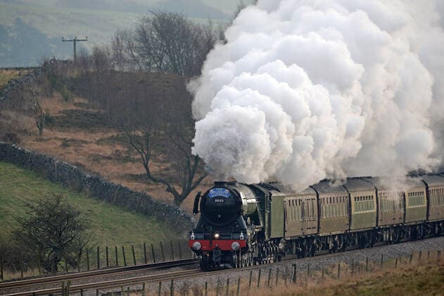 December 4, 2019, Pennines, North Yorkshire, United Kingdom: Wednesday 3rd December 2019 .Picture Credit Andy Jones CAG Photography .Picture Shows ..Flying Scotsman hauls The Christmas Dalesman through the Dales on the Settle-Carlisle line. Seen here between Horton-in-Ribblesdale and Selside with Pen-Y-Ghent in the background...Where: Pennines, North Yorkshire , United Kingdom.When: 04 Dec 2019.Credit: Charlotte GrahamCover Images..**EDITORIAL USE ONLY. No other printed material magazines, books, posters, without written permission of the copyright holder Charlotte GrahamCAG Photography Ltd. Pennines United Kingdom - ZUMAc218 20191204_zia_c218_033 Copyright: xCOVERxImagesx