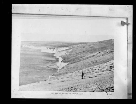 Glass Negative - Copy, Margin of the Ice-Caped Land , Cape Denison, Australasian Antarctic Expedition (AAE), Antarctica, 1911-1914, Black and white glass negative which is a copy of a page from Sir Douglas Mawson s book Home of the Blizzard . One of 328 images in various formats including artworks, photographs, glass negatives and lantern slides.  Copyright Artokoloro LC190917_104127