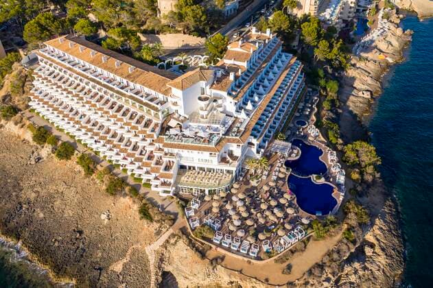 Aerial photo, view of hotel complex at rocky coast, Costa de la Calma, region Caliva, Mallorca, Balearic Islands, Spain, Europe Copyright: imageBROKER/MartinxMoxter ibxmox05087201.jpg