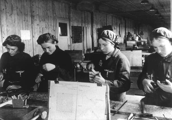 WORK German Labour Front Workers perform their daily work in an aviation factory Photography Trampus due 1944 Credit Collection KHARBINE TAPABOR  KH21008