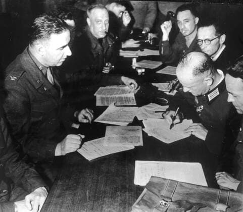Second World War In Belz, near Lorient, Colonel Borst signs the German surrender Photograph taken on May 7, 1945 Credit Collection KHARBINE TAPABOR  KH21573