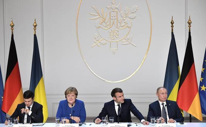 December 10, 2019. - France, Paris. - Ukraine s President Volodymyr Zelensky, Germany s Chancellor Angela Merkel, France s President Emmanuel Macron, and Russia s President Vladimir Putin (from L to R) give a news conference after a Normandy Four summit at the Elysee Palace. KremlinxPool 