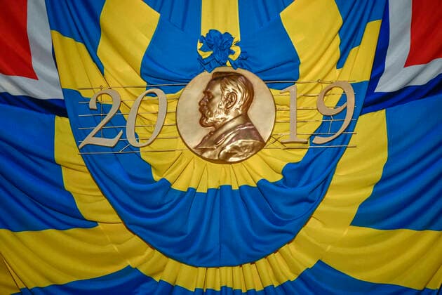 The flags of Sweden and Norway draped around a copy of the Nobel Prize medal at the Nobel award ceremony at Stockholm Concert Hall, in Stockholm on Tuesday Dec 10, 2019 STOCKHOLM SWEDEN x10060x,  Copyright: xHenrikxMontgomery TTx SWEDEN NOBEL