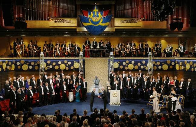 Japanese scientist Yoshino wins Nobel Prize Japanese scientist Akira Yoshino (C, L) accepts the Nobel Prize in chemistry from Swedish King Carl XVI Gustaf during a ceremony at Stockholm Concert Hall in the Swedish capital on Dec. 10, 2019. 