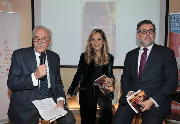 Milan, Italy AMAL event with Silvana Giacobini presenting her book, Daniela Cuzzolin Oberosler career award during the Christmas greetings cocktail In the photo: Mario Girardi, Silvana Giacobini, Gian Luca Bauzano  Copyright: xNickxZonnax xIPAx xNickxZonnax