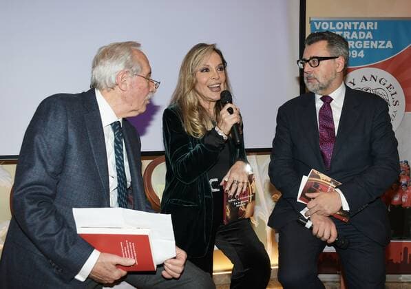 Milan, Italy AMAL event with Silvana Giacobini presenting her book, Daniela Cuzzolin Oberosler career award during the Christmas greetings cocktail In the photo: Mario Girardi, Silvana Giacobini, Gian Luca Bauzano  Copyright: xNickxZonnax xIPAx xNickxZonnax