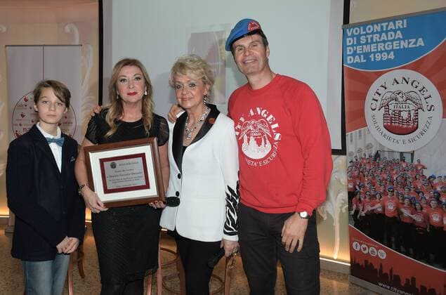 Milan, Italy AMAL event with Silvana Giacobini presenting her book, Daniela Cuzzolin Oberosler career award during the Christmas greetings cocktail In the photo: Daniela Javarone President of the Milan Association Amici della Lirica, Daniela Cuzzolin Oberosler, Mario Furlan City Angels  Copyright: xNickxZonnax xIPAx xNickxZonnax