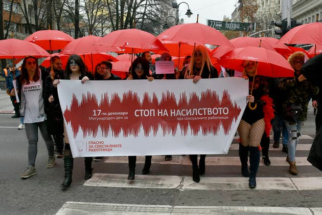 News Bilder des Tages Prostitute protest - Skopje, Macedonia 17.12.2019., Skopje, Macedonia - Annual Mars of the Red Umbrellas held to promote the rights of sex workers in Macedonia. Girls with masks and red umbrellas marched and demand from state bodies to remove prejudice and condemnation and prevent violence against sex workers.  STR-1234 HaloPix PIXSELL