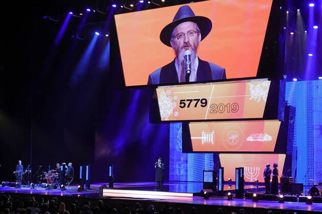 MOSCOW, RUSSIA - DECEMBER 18, 2019: Russia s Chief Rabbi Berl Lazar (C) during a ceremony to present the 18th Fiddler on the Roof awards of the Federation of Jewish Communities of Russia at the State Kremlin Palace. First introduced in 2001, the annual Fiddler on the Roof awards celebrate notable contributions into the development of Russia s Jewish community in public activities, arts and culture. Mikhail Japaridze TASS  TS0C7CFE