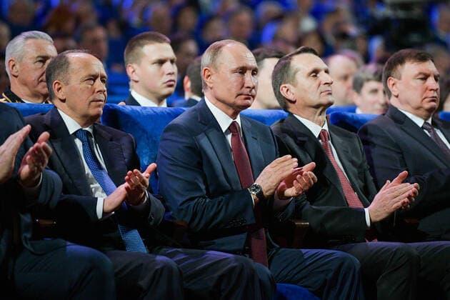 MOSCOW, RUSSIA - DECEMBER 19, 2019: Russian Federal Security Service (FSB) Chief Alexander Bortnikov, Russia s President Vladimir Putin, and Russian Foreign Intelligence Service Chief Sergei Naryshkin (L-R) at a concert marking Russian Security Agency Officer Day. Alexei Druzhinin Russian Presidential Press and Information Office TASS  TS0C7F36