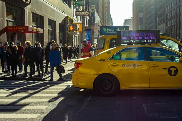 Crowds in New York Pedestrians share space at an intersection in Midtown Manhattan New York on Friday, December 20, 2019. (  RichardxB.xLevine