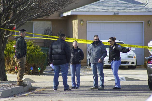 December 26, 2019, Albuquerque, NEW MEXICO, USA: 122619 .Rio Rancho Police Officers canvas the neighborhood while investigating after 4 people were found shot on Christmas Day at a home located in Northern Meadows .Photographed on Thursday December 26, 2019. JOURNAL Albuquerque USA - ZUMAab1_ 20191226_zaf_ab1_005 Copyright: xAdolphexPierre-Louisx
