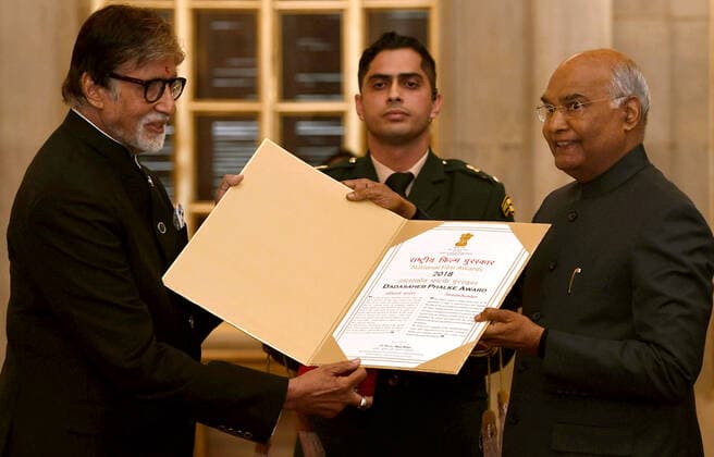 (191230) -- NEW DELHI, Dec. 30, 2019 -- Indian President Ram Nath Kovind (R) presents Dadasaheb Phalke award to Indian superstar and veteran actor Amitabh Bachchan (L) during a function at the Indian presidential palace in New Delhi, India on Dec. 29, 2019. Amitabh Bachchan was Sunday honoured with the country s top cinema award -- Dadasaheb Phalke award for his outstanding contribution to the film industry, officials said. (Str Xinhua) INDIA-NEW DELHI-AMITABH BACHCHAN-TOP CINEMA AWARD Stringer 