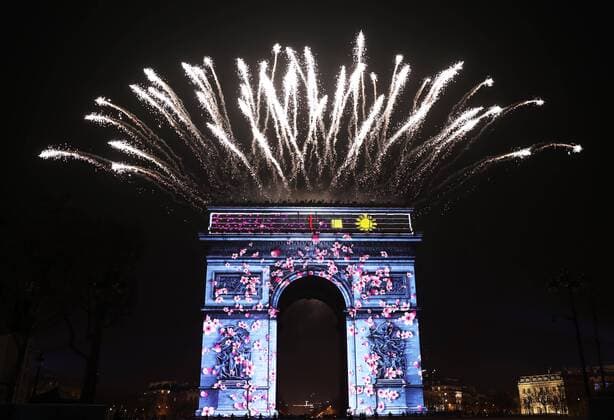 (200101) -- PARIS, Jan. 1, 2020 -- Fireworks illuminate the sky over the Arc de Triomphe during the New Year s celebrations on the Champs Elysees in Paris, France, on Jan. 1, 2020. ) FRANCE-PARIS-ARC DE TRIOMPHE-FIREWORKS GaoxJing 