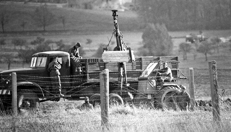 DDR border guard fortifying the death fence at Walkenried in the Harz Mountains zone border here on 10 11 1966