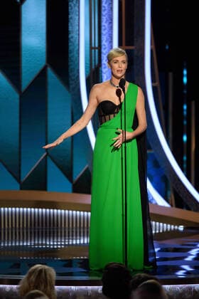 Charlize Theron presents the Cecil B. DeMille Award to Tom Hanks at the 77th Annual Golden Globe Awards at the Beverly Hilton in Beverly Hills, CA on Sunday, January 5, 2020.  Copyright: xHFPAxPhotographerx 33938-245PLX