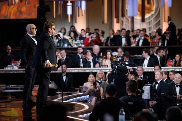 Elton John and Bernie Taupin accept the Golden Globe Award for Best Original Song - Motion Picture for Rocketman at the 77th Annual Golden Globe Awards at the Beverly Hilton in Beverly Hills, CA on Sunday, January 5, 2020.  Copyright: xHFPAxPhotographerx 33938-292PLX