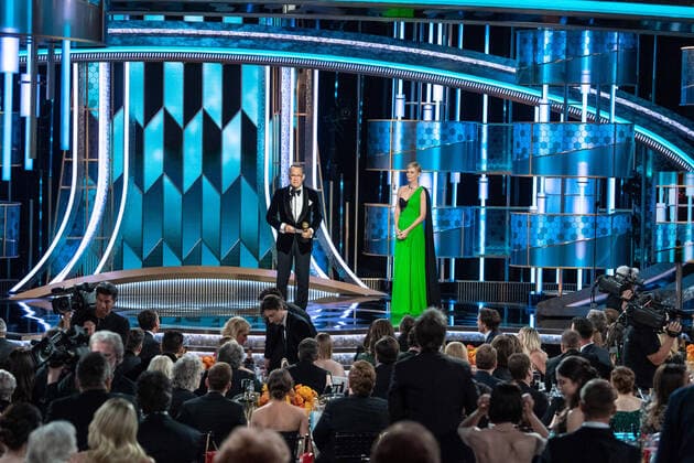 Tom Hanks accepts the Cecil B. DeMille Award for his outstanding contribution to the entertainment field from Charlize Theron, at the 77th Annual Golden Globe Awards at the Beverly Hilton in Beverly Hills, CA on January 5, 2020.  Copyright: xHFPAxPhotographerx 33938-303PLX