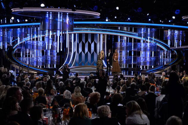 Laura Dern accepts the Golden Globe Award for Best Performance by an Actress in a Supporting Role in any Motion Picture for her role in Marriage Story from presenter, Gwyneth Paltrow at the 77th Annual Golden Globe Awards at the Beverly Hilton in Beverly Hills, CA on Sunday, January 5, 2020.  Copyright: xHFPAxPhotographerx 33938-319PLX