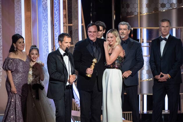 David Heyman accepts the Golden Globe Award for Best Motion Picture - Musical or Comedy for Once Upon a Time... in Hollywood from presenters, Pierce Brosnan and Will Ferrell at the 77th Annual Golden Globe Awards at the Beverly Hilton in Beverly Hills, CA on Sunday, January 5, 2020.  Copyright: xHFPAxPhotographerx 33938-356PLX