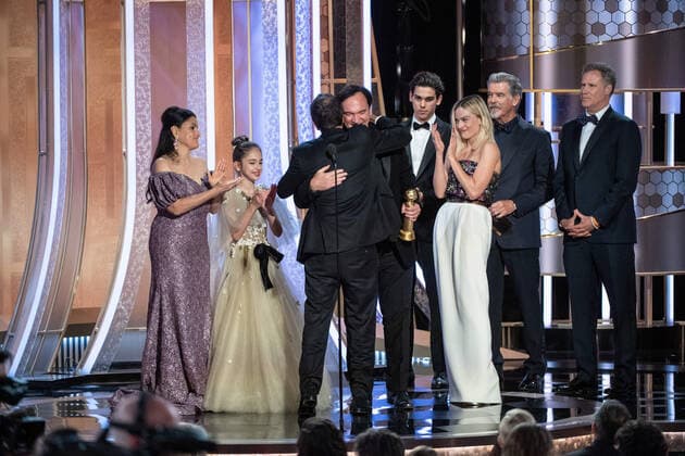 David Heyman and Quentin Tarantino accept the Golden Globe Award for Best Motion Picture - Musical or Comedy for Once Upon a Time... in Hollywood from presenters, Pierce Brosnan and Will Ferrell at the 77th Annual Golden Globe Awards at the Beverly Hilton in Beverly Hills, CA on Sunday, January 5, 2020.  Copyright: xHFPAxPhotographerx 33938-357PLX