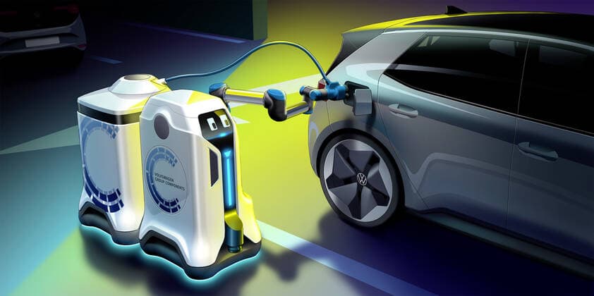 Volkswagen has claimed that electric car owners won t need to drive to charging stations in the future - because the charger will be delivered to them via robots. The German auto giant says it is developing mobile charging robots , which will autonomously drive themselves to a car s locations, open the socket flap and plug it into a compact charging device without any need for human interaction. The robots are aimed at providing charging solutions in multi-storey and underground car parks where space is at a minimum. New Volkswagen models equipped with the brand s latest V2X communication system will be able to request the services of one of these robots. An alert can be raised on a mobile phone all to notify that the car needs to be charged and its location in the car park. Self-driving robots will then transport a mobile energy st Copyright: xVolkswagen CoverxImagesx 40152241 EDITORIAL USE ONLY. NOT FOR USE BY NEWSPAPERS BASED IN THE UK.