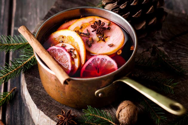 Mulled wine with oranges and cinnamon in a saucepan  SBDF04136