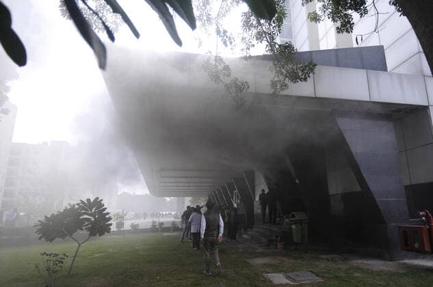 NOIDA, INDIA - JANUARY 9: Smoke rises after a fire incident in the basement of ESIC Hospital at Sector 24 on January 9, 2020 in Noida, India. (Photo by Sunil Ghosh Hindustan Times) Fire At Noida ESIC Hospital