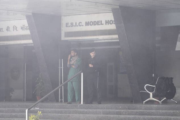 NOIDA, INDIA - JANUARY 9: Smoke fills the air during a fire incident in the basement of ESIC Hospital at Sector 24 on January 9, 2020 in Noida, India. (Photo by Sunil Ghosh Hindustan Times) Fire At Noida ESIC Hospital