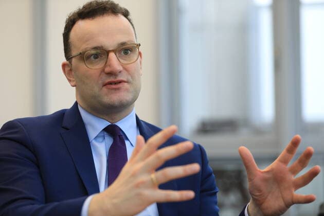 Jens Spahn, Federal Minister of Health, Member of the German Bundestag and of the CDU Executive Committee, takes a photograph during an interview in his office in the Ministry in Berlin Mitte Berlin Berlin Germany Copyright: xThiloxRückeisxTSPx